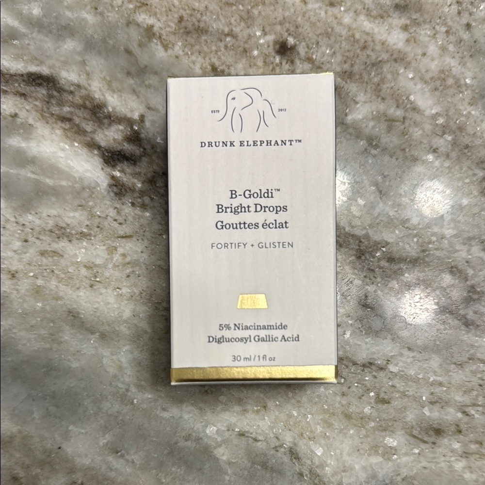 Drunk Elephant B-Goldi Bright Drops - Elegant White and Gold